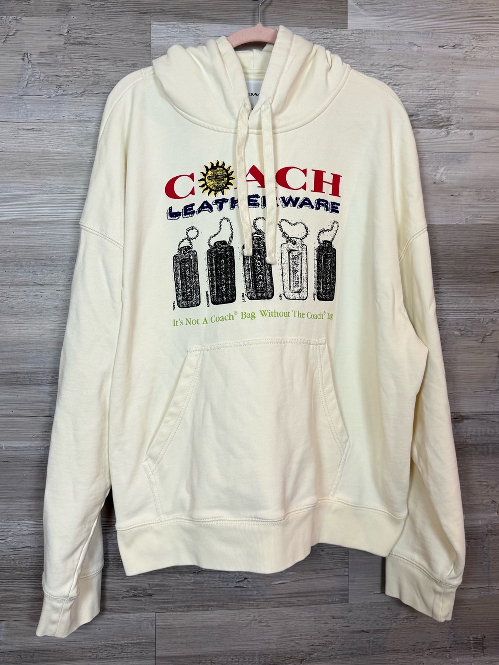 Coach Cream Graphic Pullover Hoodie with Printed Logo